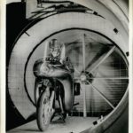 Nov. 11, 1958 - WIND TUNNEL TEST OF STREAMLINED PROTECTION: Streamlining and weather and crash protection have been added to motorcycles by a British Aircraft manufacturer and demonstrated at the International Cycle and Motor Cycle Exhibition, London, Nov